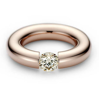 Niessing:  18K Gold Diamond Tension-Set Ring