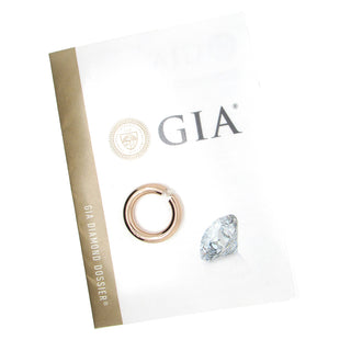 Niessing:  18K Gold Diamond Tension-Set Ring