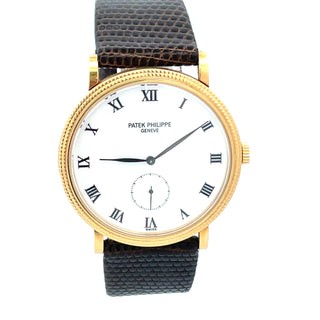 18K Patek Philippe Calatrava Ref. 3919J. Certificate