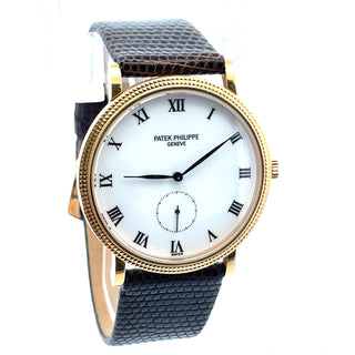 18K Patek Philippe Calatrava Ref. 3919J. Certificate