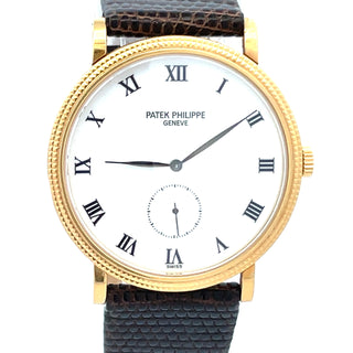 18K Patek Philippe Calatrava Ref. 3919J. Certificate