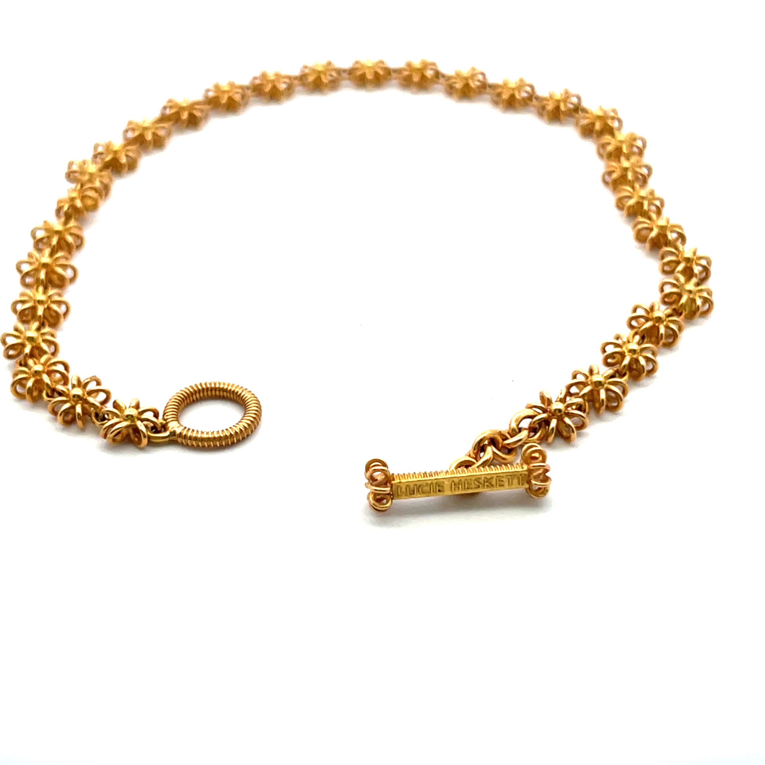 Lucie Heskett-Brem: 20K Pink Gold Flower Link Bracelet - Image 5